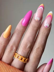 Unhas decoradas branco, rosa e laranja