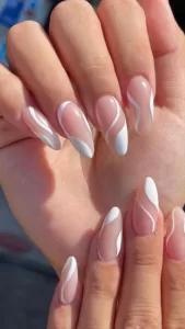 unhas decoradas branco e transparente